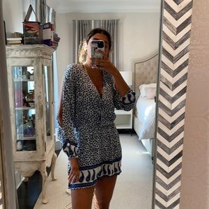 Blue and white floral romper , slits on the arms,S